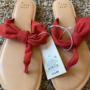 Red bow flip flops from target brand new still with the tag!